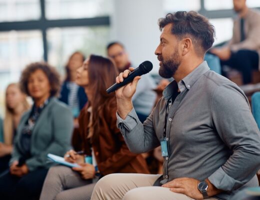 man speaking at a networking event